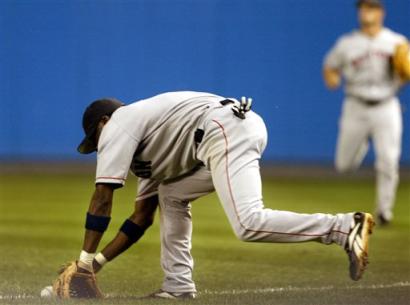 second verse, same as the first.  it would seem hard to NOT get 320 pounds of dominican in front of a grounder.  suggested: use the other side of the glove, might work a little  better.